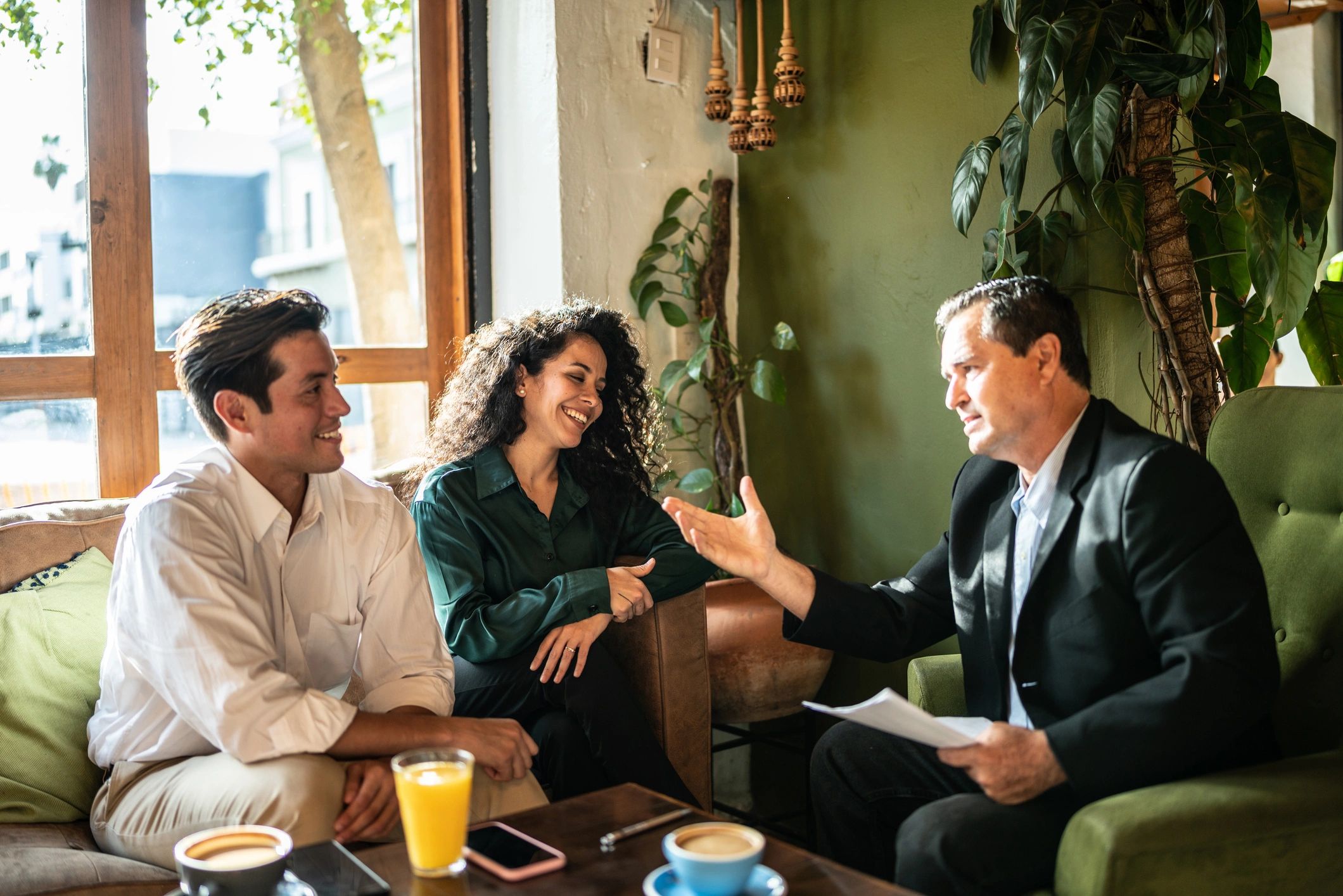 Clients meeting with a financial advisor